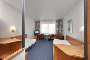 Modern ausgestattetes Doppelzimmer des NKF-Hotels in Springe. 